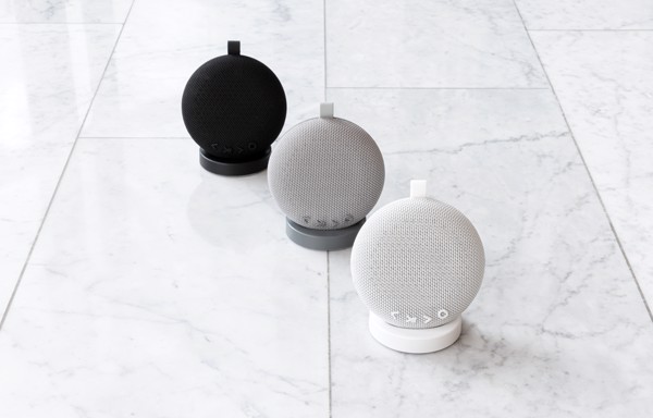 Wireless charging and speaker base with USB