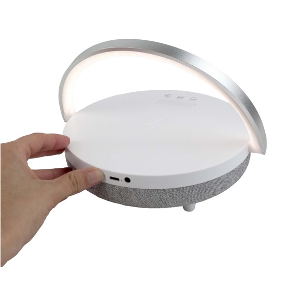 Prixton 4-in-1 10W Bluetooth® speaker with LED light and wireless charging base - White