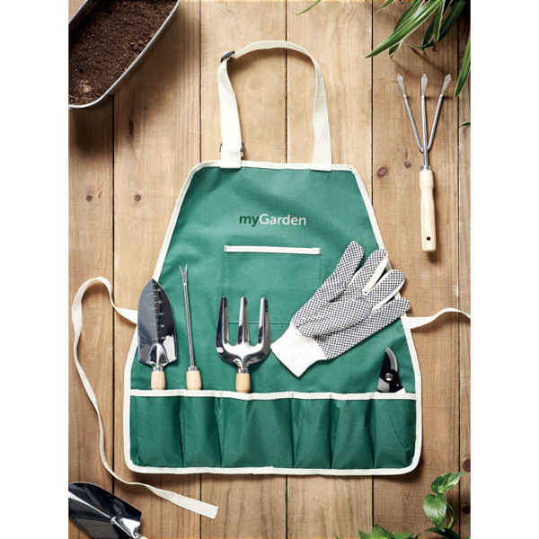 Garden tools in apron Greenhands