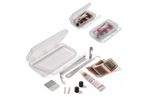 Tire repair kit in plastic box